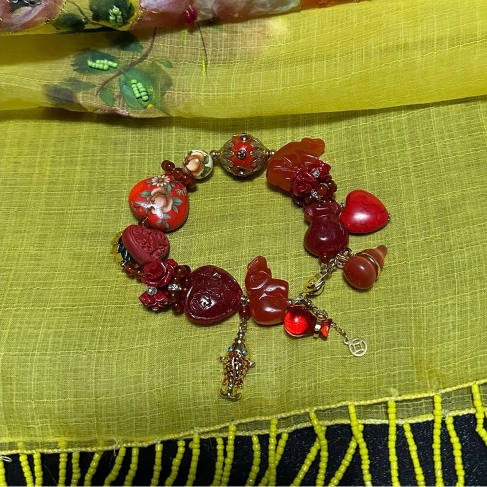 Cinnabar, Coral and Carnelian charm bracelet